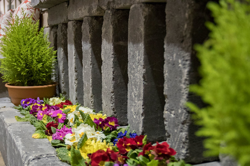 Charcoal Chateau Wall™ open garden wall slats planter box flowers